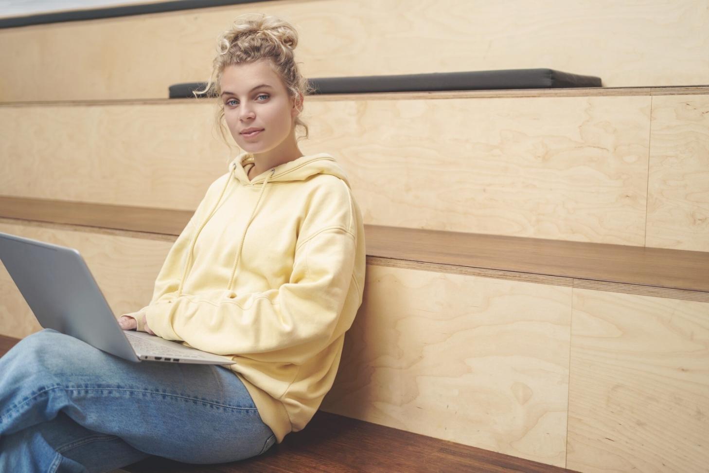 Professional design studio setup with modern equipment and learning materials